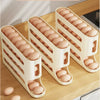 Gravity-fed rolling egg tray organizer