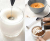 Electric milk frother and egg whisk in use