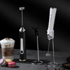 Compact handheld frother for milk foam