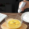 Handheld electric milk frother, battery powered
